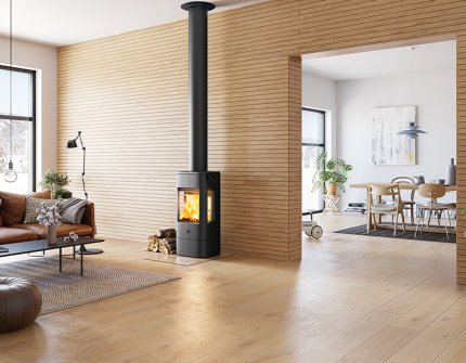 Jøtul F 232 schwarzer Holzofen im skandinavischen Wohnzimmer 